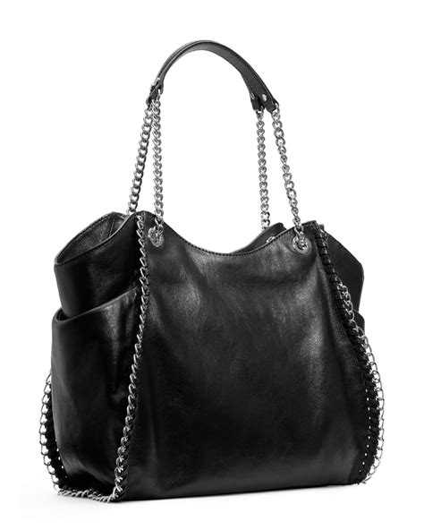 michael kors chelsea two-tone large black totes|Michael Kors black totes.